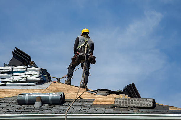 Professional Roofing technician working in New River, VA